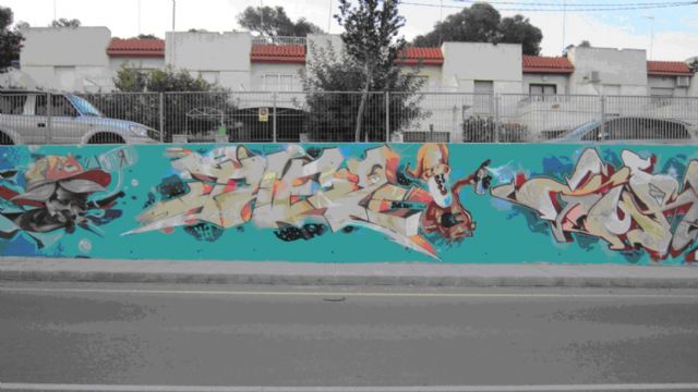 La calle Mayor de Canteras se convierte en un lienzo de arte urbano